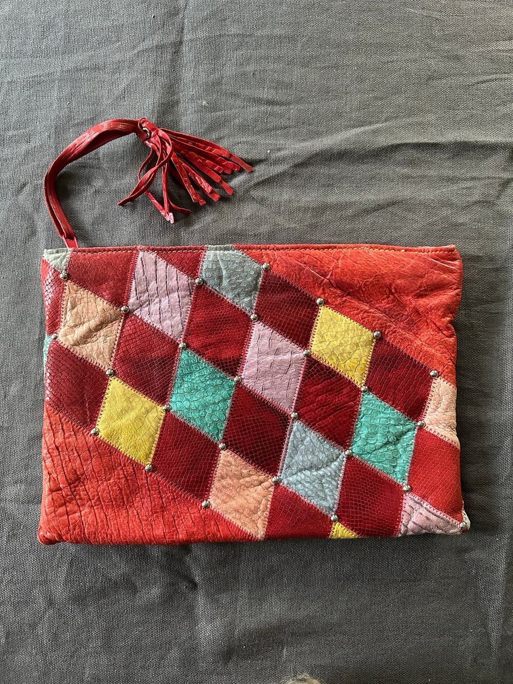 Vintage wristlet clutch large leather patchwork
Unique red